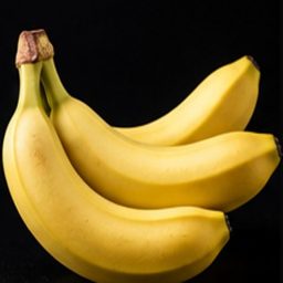 Mashed banana specimen photographed on a black background