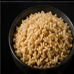 Brown rice photographed on black