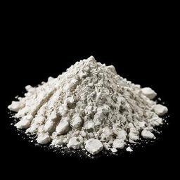 Kaolin clay specimen photographed on a black background