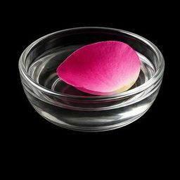 Rose water specimen photographed on a black background